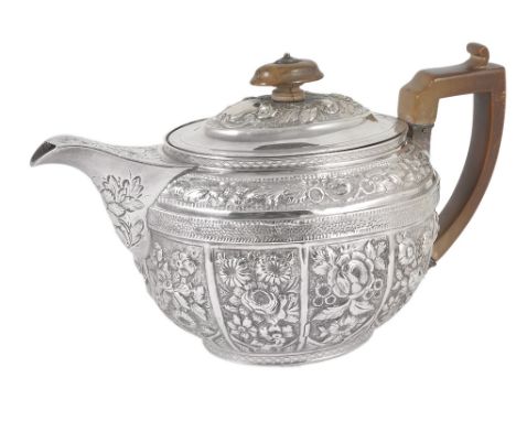 A GEORGE III AND LATER CHASED SILVER TEAPOT, JOHN EMES, LONDON, 1805 oval, richly chased with panels and bands of flowers on 