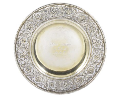 A VICTORIAN SILVER-GILT DISH, MAKER'S MARK RUBBED, LONDON, 1886 with presentation inscription and pierced border of scrolling
