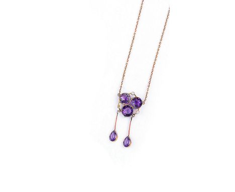 AMETHYST NECKLACE, 1900s designed with three circular amethysts accented with seed pearls connected by knife wire to pear-sha