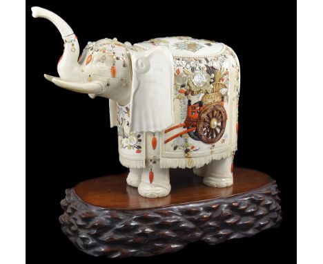 A JAPANESE 'SHIBAYAMA' WORK IVORY FIGURE OF AN ELEPHANT, MEIJI PERIOD (1868-1912) the beast with raised trunk and richly capa