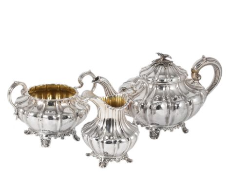 A VICTORIAN SILVER THREE-PIECE TEA SET, PROBABLY J. WHITEHOUSE, LONDON, 1837/38 compressed fluted circular, engraved with a c