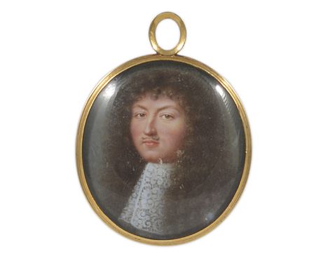 A PORTRAIT MINIATURE OF LOUIS XIV, KING OF FRANCE AND NAVARRE, STUDIO OF JEAN PETITOT (1607-1691), CIRCA 1675 brown wig, lace