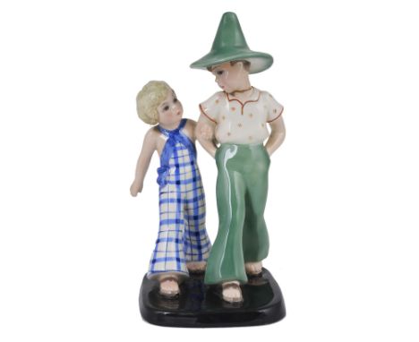A GOLDSCHEIDER GROUP OF A BOY AND GIRL, VIENNA, CIRCA 1935 modelled walking arm in arm, the boy with wide brimmed green hat a