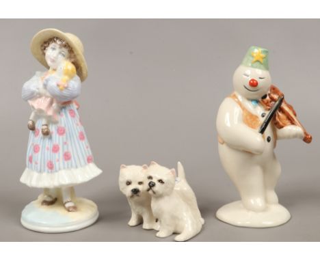 Three collectable ceramic figures, a Royal Doulton example from the Snowman gift collection 'Violinist' along with one by Coa