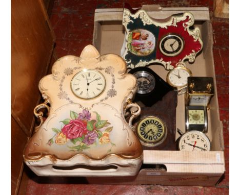 Eight various clocks and time pieces to include manual wind and quartz examples.