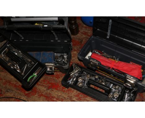 Two Stanley tool boxes and contents of engineer tools; socket set, spanners etc.