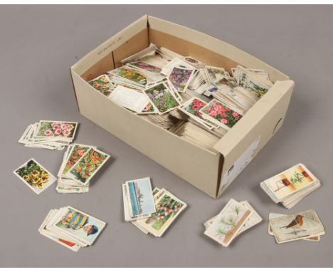 A box of cigarette and tea cards to include Wills, Brooke Bond, Gallaher etc.