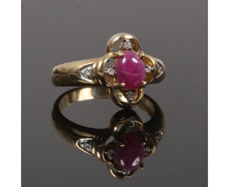 A 9ct gold cabochon, ruby and diamond ring, size O.