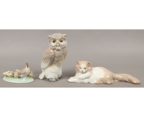 A Nao model of an owl, one of a cat and a Nao group of hen and chicks.