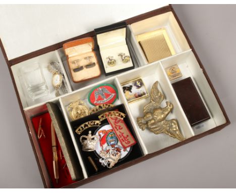 A case of collectables to include cufflinks, enamel badges, compact etc.