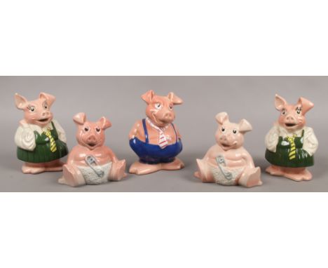 Five Natwest advertising ceramic piggy banks by Wade.