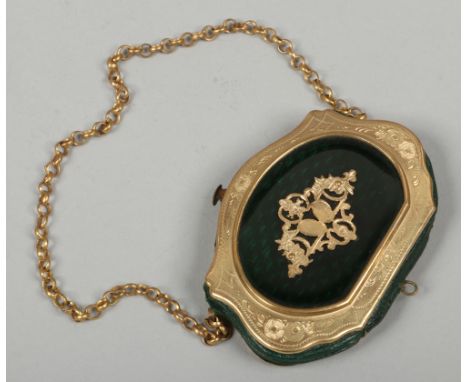 A Victorian gilt metal and enamel sovereign purse.