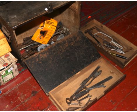 A locking wooden chest of hand tools, including pliers, drivers, spanners, chisels etc with padlock and key.
