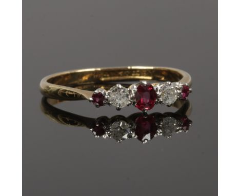 An 18ct gold and platinum ruby and diamond fiver stone ring, size P.