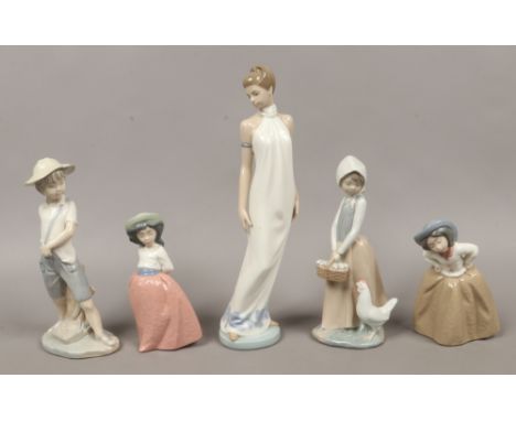 Five Nao figures one formed as a lady and the others as children.