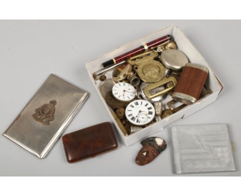 A box of mixed collectables including military cigarette case, belt buckles, pocket watch and pocket watch movements and meda