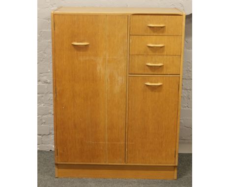 A G Plan light oak tallboy.