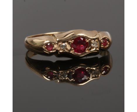 An 18ct gold, ruby and diamond five stone ring, assayed Chester 1915, size L.