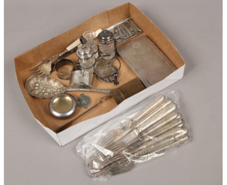 A box of mixed silver plated wares including cigarette case, dessert knives and forks and part cruet set etc.