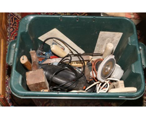 A box of tools to include jigsaw, wood plane, hammers etc.