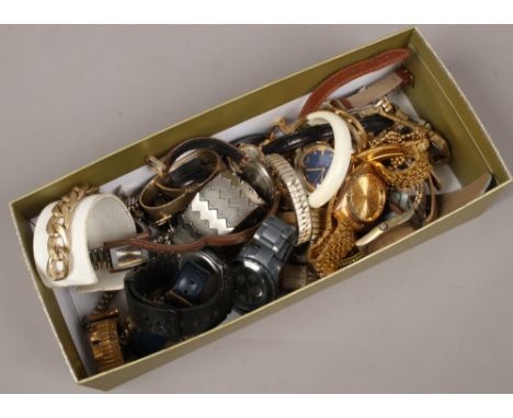 A box of various ladies and gents wristwatches to include quartz and manual examples.
