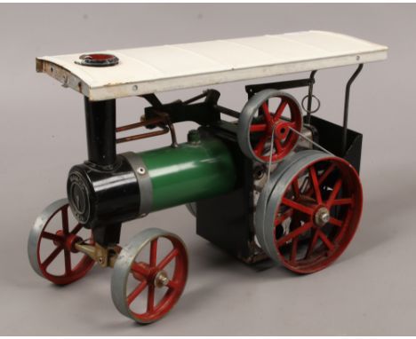 A vintage Mamod TE1A steam tractor with burner.Condition report intended as a guide only.Lacking steering rod.