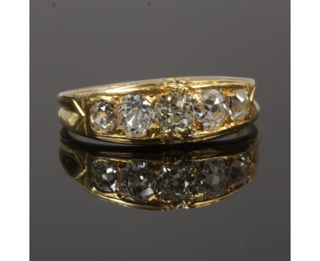 A yellow metal and 5 diamond ring, size Q.