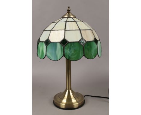 A brushed base Tiffany style table lamp with lead glazed shade.