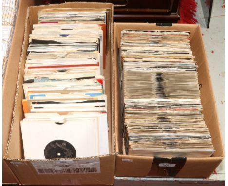 Two boxes of single records to include Fleetwood Mac, Prince, Bob Dylan etc.