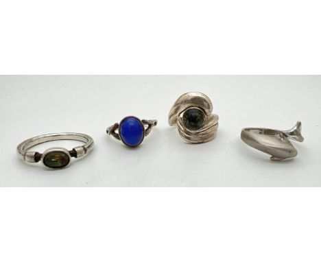 4 silver dress rings. To include dolphin ring and 2 labradorite set rings. Silver marks to all bands. Sizes K, M, P and R. 