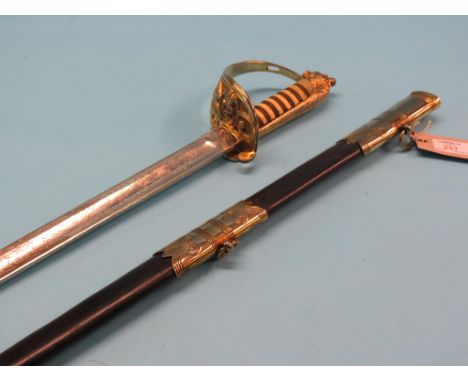 A naval officer's sword, 31in. straight, single-edged blade, within brass-mounted leather scabbard.  Shipping arrangements li