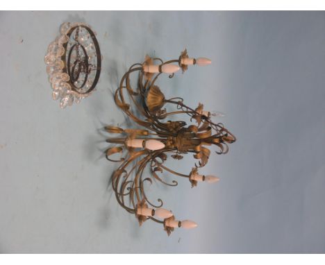 An Harrod's gilt metal seven-sconce chandelier, 2ft. 4in. diameter, and a cut glass ceiling-pendant light shade