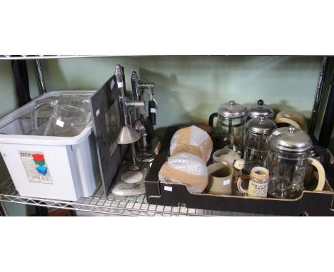 A shelf full of useful and collectable domestic items