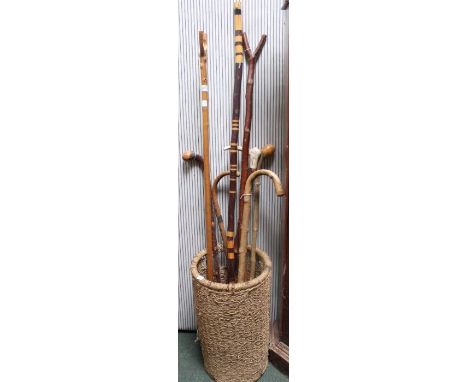 A selection of sticks in a wicker stick stand