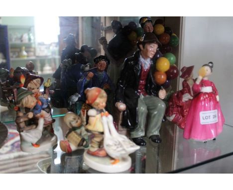 A selection of Doulton and Goebel figurines