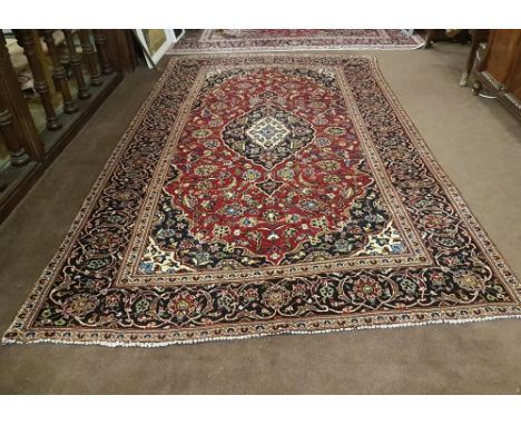 Red Ground Persian Kashan Carpet, with a traditional Kashan Design, 3.13m x 1.94m