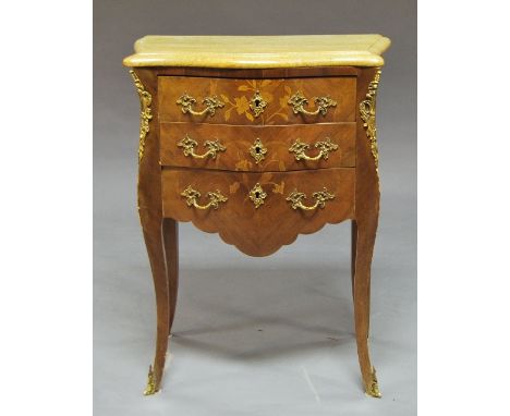 A French miniature commode, 20th century, inlaid to the front with floral marquetry, with three short drawers, on long cabrio