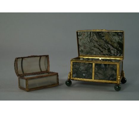 A gilt metal and agate rectangular casket, 19th century, with green mottled stone sides on ball feet, 8.2cm wide, together wi