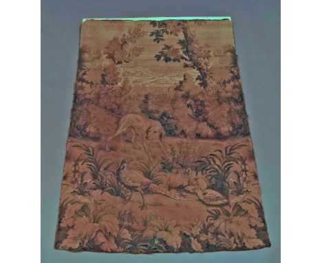 A late 19th early 20th century tapestry depicting a hound and pheasants in wooded landscape, approx 200cm x 130cm.