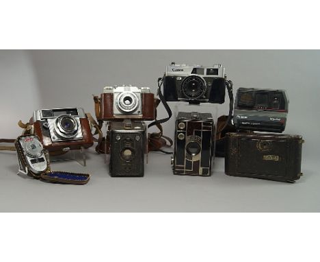 A Canon Canonet QL25 camera, with 45mm 1:25, lens and leather case, together with a large collection of cameras, various date