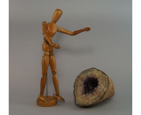 A specimen rock sample comprising a band of Onyx, lined with bands of Amethyst crystals, 24cm long, together with a Morilla a