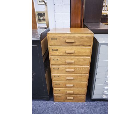 A LIGHT OAK CHEST OF EIGHT FILING DRAWERS WITH WOODEN HANDLES AND BRAS LABEL HOLDERS, 1' 5" WIDE, 3'4" HIGH 