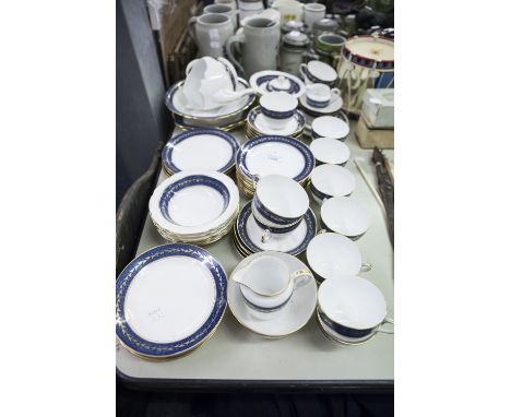TUSCAN CHINA TEA AND DESSERT SERVICE WITH BLUE AND GILT BORDERS FOR 12 PERSONS, 68 PIECES (SOME A.F.) 