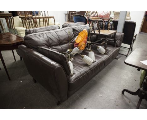 A CHOCOLATE BROWN LEATHER THREE PIECE SUITE, COMPRISING; A FOUR SEATER SOFA AND TWO MATCHING ARMCHAIRS (3)  (RETAIL PRICE £20