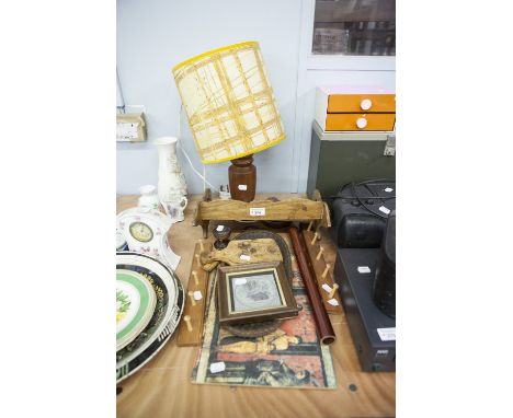 AN OAK BOOK TROUGH, WOODEN LAMP AND VARIOUS WOODEN ITEMS 
