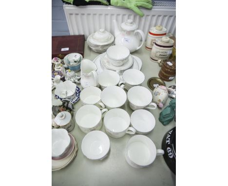 TWENTY SEVEN PIECE ROYAL DOULTON 'TWILIGHT ROSE' PATTERN CHINA TEA AND COFFEE SET FOR FOUR PERSONS, including teapot, three s