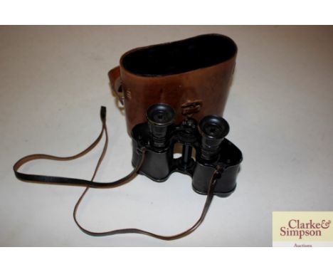A pair vintage field glasses in leather case