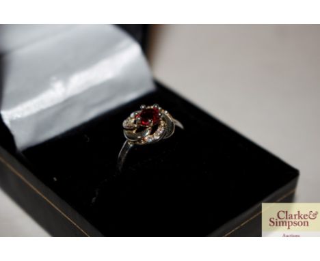 A 925 mark ruby type set ring