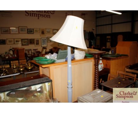 A grey painted standard lamp with fluted column and shade 