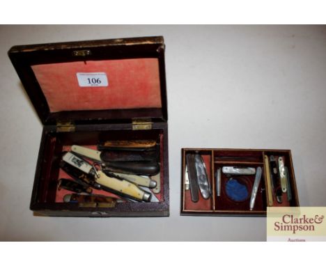 A leather covered jewellery box and contents of various vintage penknives